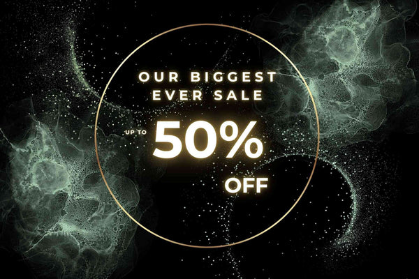 Promotional text for a sale with 'Up to 50% Off' on a dark background with abstract designs.