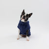 A Small Dog wearing a Snoot Style Fleece Dog Coat.