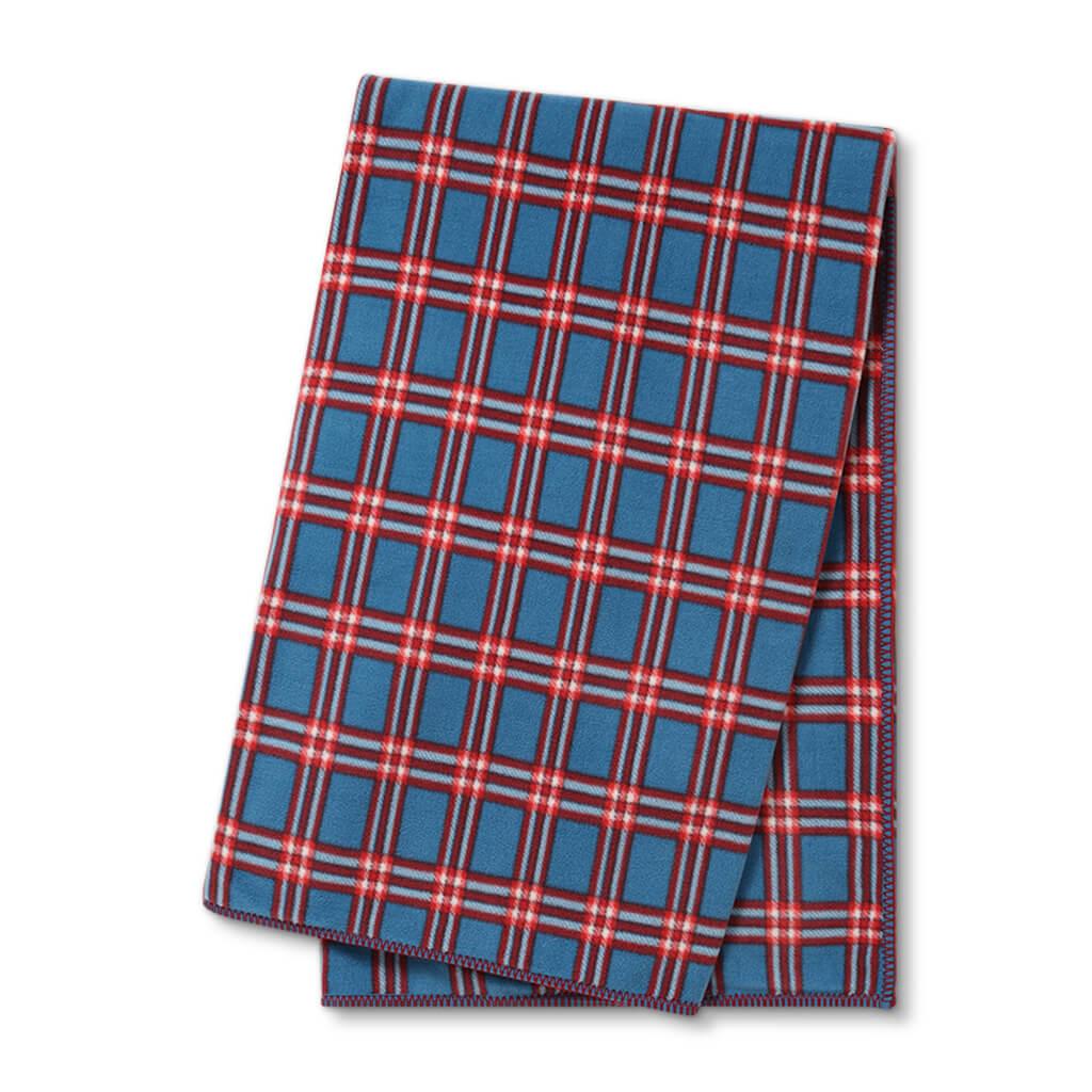 A blue and red check fleece blanket folded neatly.