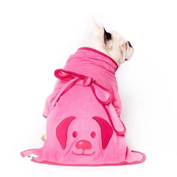 A French Bulldog wearing a pink dog drying coat.