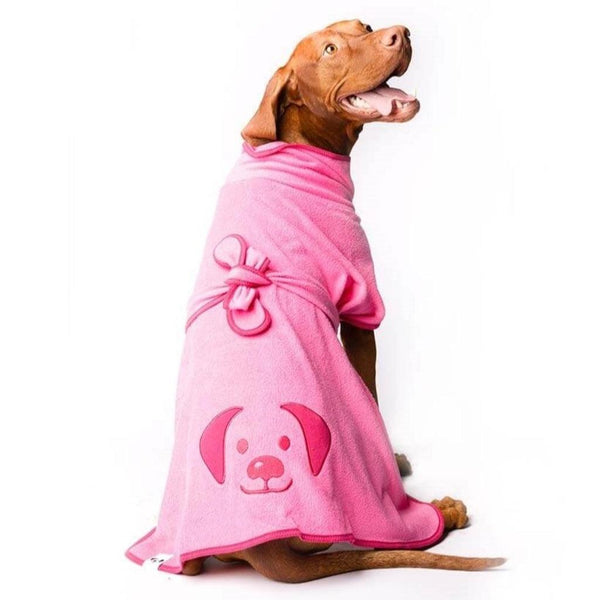 A Vizsla dog wearing a pink dog towel robe.